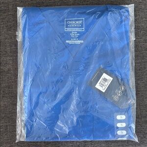 Cherokee Flexible scrub top and bottom with jacket. Top/bottom brand new!